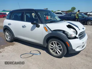 2015 MINI Countryman with VIN WMWZB3C55FWR43773, listed as a IAAI auction lot 42510137 with 150,764 mi miles and . Bid and sale history available at DreamBid. Image 1.