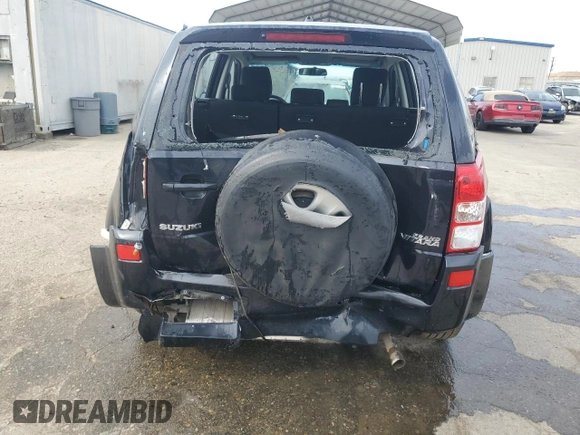 2007 Suzuki Grand Vitara with VIN JS3TE941474202110, listed as a Copart auction lot 52110865 with 132,661 mi miles and Salvage title. Bid and sale history available at DreamBid. Image 6.