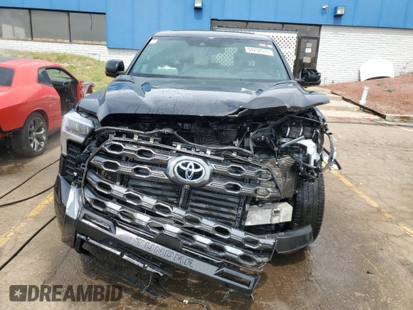 2023 Toyota Tundra Platinum Hybrid with VIN 5TFNC5DBXPX013832, listed as a Copart auction lot 54232575 with 52,894 mi miles and Clean title. Bid and sale history available at DreamBid. Image 5.
