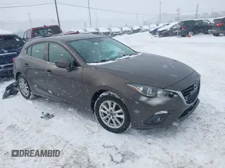 2015 Mazda Mazda3 i Touring with VIN 3MZBM1L75FM237176, listed as a IAAI auction lot 41407265 with 122,899 mi miles. Bid and sale history available at carsss.com. Image 1.