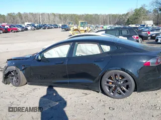 2021 Tesla Model S Long Range z VIN 5YJSA1E50MF438864, wystawiony jako IAAI lot #41190778 z przebiegiem Nie podano mil oraz . Historia ofert i sprzedaży dostępna na DreamBid. Obrazek 15.