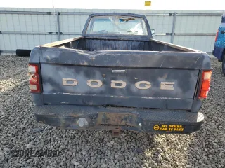 1988 Dodge Dakota z VIN 1B7GN14X5JS776983, wystawiony jako Copart lot #76597944 z przebiegiem 133 654 mil mil oraz Czysty tytuł • Clean title. Historia ofert i sprzedaży dostępna na DreamBid. Obrazek 10.