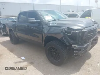 2024 Ram 1500 Big Horn with VIN 1C6SRFFT5RN184572, listed as a IAAI auction lot 42329848 with 32,567 mi miles and . Bid and sale history available at DreamBid. Image 1.