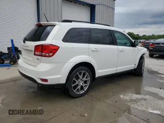 2014 Dodge Journey R/T with VIN 3C4PDCEG0ET309861, listed as a Copart auction lot 55318185 with 185,526 mi miles and Salvage title. Bid and sale history available at DreamBid. Image 3.