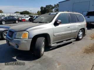 2003 GMC Envoy SLT with VIN 1GKDT13S832327481, listed as a Copart auction lot 72253474 with Not Provided miles and Salvage Title. Bid and sale history available at DreamBid. Image 1.