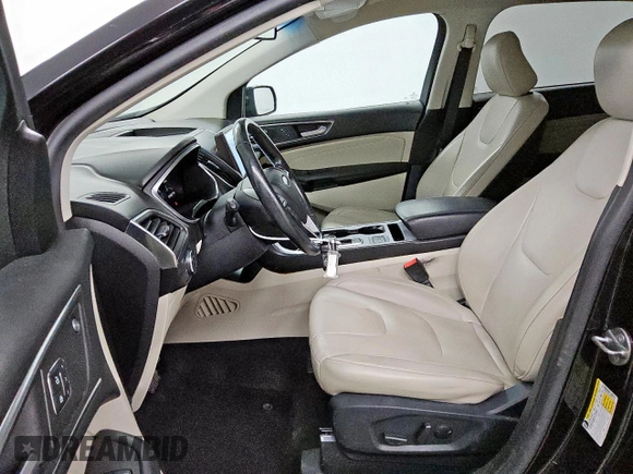 2021 Ford Edge Titanium с VIN 2FMPK4K94MBA27083, выставлен на аукционе Copart как лот 62149285 с пробегом 128 325 миль миль и Чистый • Clean title. История ставок и продаж доступна на DreamBid. Изображение 7.