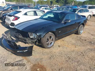 2005 Ford Mustang GT Deluxe with VIN 1ZVHT82H455205677, listed as a IAAI auction lot 42651512 with 221,876 mi miles and . Bid and sale history available at DreamBid. Image 2.