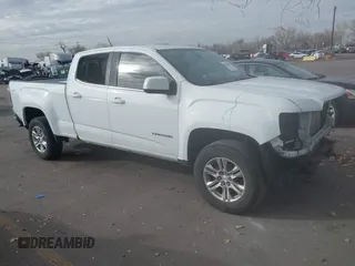2019 GMC Canyon 4WD SLE z VIN 1GTG6CEN5K1297945, wystawiony jako IAAI lot #41308105 z przebiegiem 93 226 mil mil oraz . Historia ofert i sprzedaży dostępna na DreamBid. Obrazek 1.