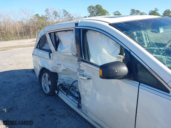 2012 Honda Odyssey Touring with VIN 5FNRL5H96CB010701, listed as a IAAI auction lot 41595565 with NaN miles. Bid and sale history available at carsss.com. Image 6.