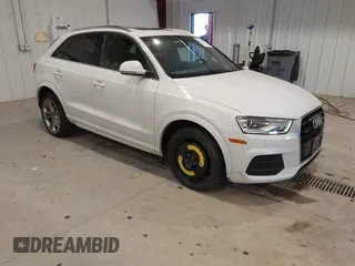2016 Audi Q3 Premium Plus with VIN WA1EFCFS2GR015940, listed as a IAAI auction lot 41243107 with 91,538 mi miles. Bid and sale history available at carsss.com. Image 1.