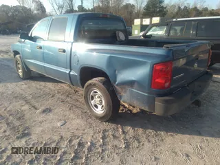 2006 Dodge Dakota ST with VIN 1D7HE28K16S527599, listed as a IAAI auction lot 41535854 with 295,983 mi miles and . Bid and sale history available at carsss.com. Image 3.
