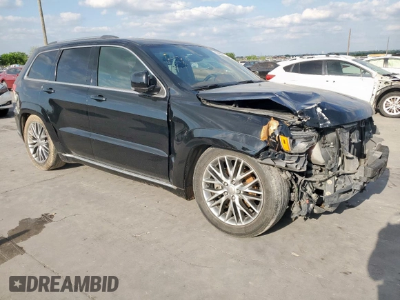 2017 Jeep Grand Cherokee Summit with VIN 1C4RJFJT2HC867426, listed as a Copart auction lot 53620325 with 128,163 mi miles and Clean title. Bid and sale history available at DreamBid. Image 4.