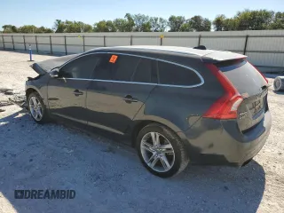 2015 Volvo V60 T5 Drive-E Premier with VIN YV140MEK7F1251940, listed as a Copart auction lot 73695834 with 143,663 mi miles and Salvage Title. Bid and sale history available at carsss.com. Image 2.