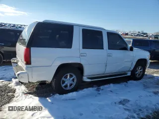 1999 Cadillac Escalade z VIN 1GYEK13R3XR406970, wystawiony jako Copart lot #87623365 z przebiegiem 189 339 mil mil oraz Szkoda całkowita • Salvage title. Historia ofert i sprzedaży dostępna na DreamBid. Obrazek 3.