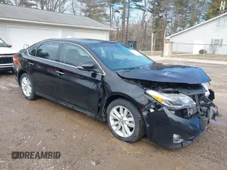 2014 Toyota Avalon Limited with VIN 4T1BK1EB2EU103936, listed as a IAAI auction lot 41703894 with 104,657 mi miles. Bid and sale history available at carsss.com. Image 1.