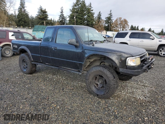1997 Ford Ranger XLT with VIN 1FTCR15X8VPB38589, listed as a Copart auction lot 80037124 with 212,826 mi miles and Salvage Title. Bid and sale history available at DreamBid. Image 4.
