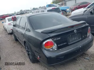 2002 Nissan Maxima GXE z VIN JN1DA31D22T424057, wystawiony jako IAAI lot #42214501 z przebiegiem 178 038 mil mil oraz . Historia ofert i sprzedaży dostępna na DreamBid. Obrazek 3.