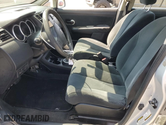 2010 Nissan Versa S with VIN 3N1BC1CP1AL408030, listed as a Copart auction lot 59906325 with 125,243 mi miles and Salvage title. Bid and sale history available at DreamBid. Image 7.