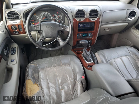 2003 GMC Envoy SLE z VIN 1GKDS13S632143174, wystawiony jako Copart lot #81514914 z przebiegiem Nie podano mil oraz Szkoda całkowita • Salvage title. Historia ofert i sprzedaży dostępna na DreamBid. Obrazek 8.