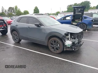 2023 Mazda CX-30 S Carbon Edition with VIN 3MVDMBCM9PM574358, listed as a IAAI auction lot 42105931 with 55,975 mi miles and . Bid and sale history available at DreamBid. Image 1.