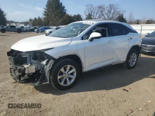 2016 Lexus RX 350 with VIN JTJBZMCA3G2000595, listed as a Copart auction lot 48663125 with 127,776 mi miles and Salvage Title. Bid and sale history available at DreamBid. Image 1.