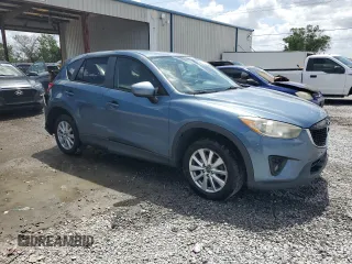 2014 Mazda CX-5 Touring with VIN JM3KE4CYXE0409558, listed as a Copart auction lot 51762995 with 91,082 mi miles and Salvage Title. Bid and sale history available at carsss.com. Image 4.