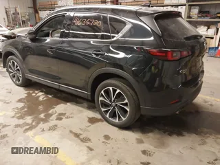 2023 Mazda CX-5 2.5 S Premium Package with VIN JM3KFBDM4P0229766, listed as a IAAI auction lot 41635720 with 38,664 mi miles. Bid and sale history available at carsss.com. Image 3.
