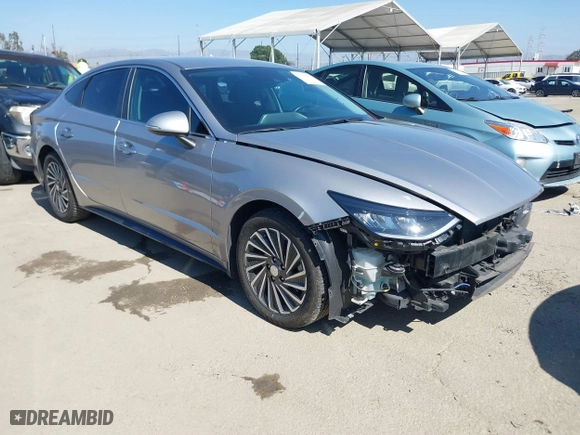 2021 Hyundai Sonata Hybrid SEL with VIN KMHL34JJ7MA026559, listed as a IAAI auction lot 41657589 with 119,019 mi miles. Bid and sale history available at carsss.com. Image 1.