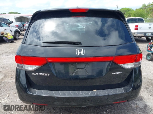 2014 Honda Odyssey Touring with VIN 5FNRL5H94EB057499, listed as a IAAI auction lot 41983956 with 158,573 mi miles and . Bid and sale history available at DreamBid. Image 16.