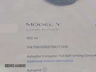 2025 Tesla Model Y Long Range with VIN 7SAYGDED7SA373235, listed as a IAAI auction lot 42100950 with 650 mi miles and . Bid and sale history available at DreamBid. Image 16.