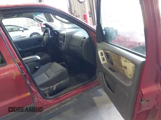 2004 Ford Escape XLT with VIN 1FMYU031X4KA86449, listed as a IAAI auction lot 42629506 with 231,115 mi miles and . Bid and sale history available at DreamBid. Image 5.