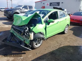 2014 Ford Fiesta SE with VIN 3FADP4BJ2EM203010, listed as a IAAI auction lot 40763881 with 60,803 mi miles. Bid and sale history available at carsss.com. Image 2.