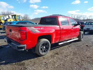 2016 Chevrolet Silverado 1500 LT with VIN 1GCUKREC4GF167939, listed as a IAAI auction lot 41439912 with 162,110 mi miles and . Bid and sale history available at DreamBid. Image 4.