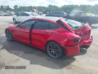 2021 Tesla Model S Plaid z VIN 5YJSA1E69MF439987, wystawiony jako IAAI lot #42496725 z przebiegiem 25 mil mil oraz . Historia ofert i sprzedaży dostępna na DreamBid. Obrazek 3.