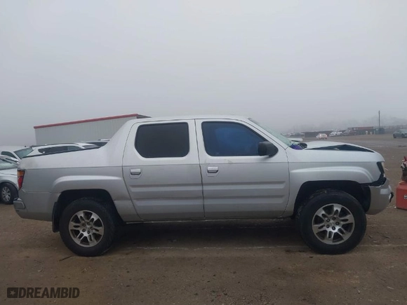 2006 Honda Ridgeline RTL with VIN 2HJYK16526H531190, listed as a IAAI auction lot 41450393 with 146,646 mi miles. Bid and sale history available at carsss.com. Image 13.