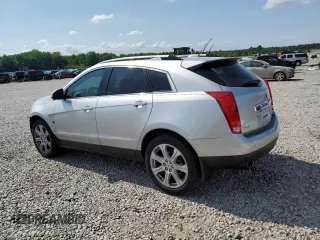 2015 Cadillac SRX Performance Collection with VIN 3GYFNCE3XFS573287, listed as a Copart auction lot 59927205 with 157,322 mi miles and Salvage title. Bid and sale history available at DreamBid. Image 2.