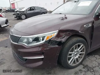 2016 Kia Optima EX with VIN 5XXGU4L31GG004714, listed as a IAAI auction lot 41183230 with 108,084 mi miles. Bid and sale history available at carsss.com. Image 6.