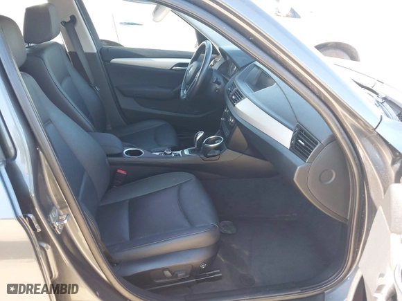 2014 BMW X1 sDrive28i with VIN WBAVM1C57EVW47767, listed as a IAAI auction lot 41867313 with 90,431 mi miles. Bid and sale history available at carsss.com. Image 5.