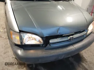 1999 Toyota Sienna CE with VIN 4T3GF19C5XU139787, listed as a IAAI auction lot 41167781 with 217,715 mi miles. Bid and sale history available at carsss.com. Image 6.