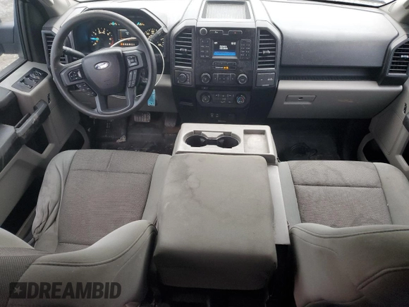 2015 Ford F-150 XLT with VIN 1FTFX1EF9FFA42214, listed as a Copart auction lot 56384325 with 121,911 mi miles and Salvage title. Bid and sale history available at DreamBid. Image 8.