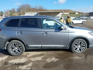 2016 Mitsubishi Outlander SE with VIN JA4AZ3A30GZ039451, listed as a IAAI auction lot 41839444 with 151,357 mi miles and . Bid and sale history available at DreamBid. Image 13.