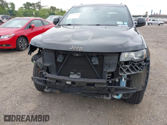 2016 Jeep Grand Cherokee Laredo z VIN 1C4RJFAG6GC475857, wystawiony jako IAAI lot #42311448 z przebiegiem 106 472 mil mil oraz . Historia ofert i sprzedaży dostępna na DreamBid. Obrazek 12.
