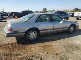 1997 Cadillac Seville Luxury SLS with VIN 1G6KS52Y0VU801906, listed as a Copart auction lot 65169364 with 191,627 mi miles and Salvage Title. Bid and sale history available at carsss.com. Image 3.