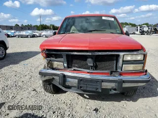 1993 GMC Suburban z VIN 1GKFK16K2PJ718788, wystawiony jako Copart lot #77080724 z przebiegiem 227 320 mil mil oraz Szkoda całkowita • Salvage title. Historia ofert i sprzedaży dostępna na DreamBid. Obrazek 5.