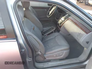 2006 Cadillac DTS 1SC z VIN 1G6KD57Y26U104838, wystawiony jako IAAI lot #41280412 z przebiegiem 172 494 mil mil oraz . Historia ofert i sprzedaży dostępna na DreamBid. Obrazek 5.
