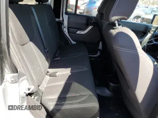 2018 Jeep Wrangler Unlimited Sahara z VIN 1C4BJWEG9JL835996, wystawiony jako Copart lot #51099005 z przebiegiem 42 962 mil mil oraz Szkoda całkowita • Salvage title. Historia ofert i sprzedaży dostępna na DreamBid. Obrazek 11.