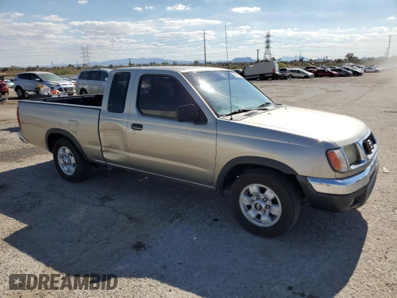 2000 Nissan Frontier XE with VIN 1N6DD26S7YC430643, listed as a Copart auction lot 59386765 with 204,851 mi miles and Salvage title. Bid and sale history available at DreamBid. Image 4.
