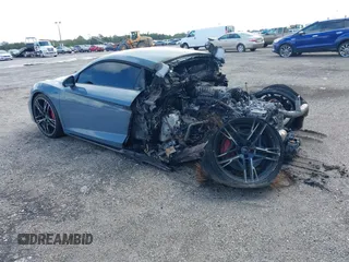 2021 Audi R8 z VIN WUAKBAFX5M7900468, wystawiony jako IAAI lot #41214857 z przebiegiem Nie podano mil oraz . Historia ofert i sprzedaży dostępna na DreamBid. Obrazek 3.