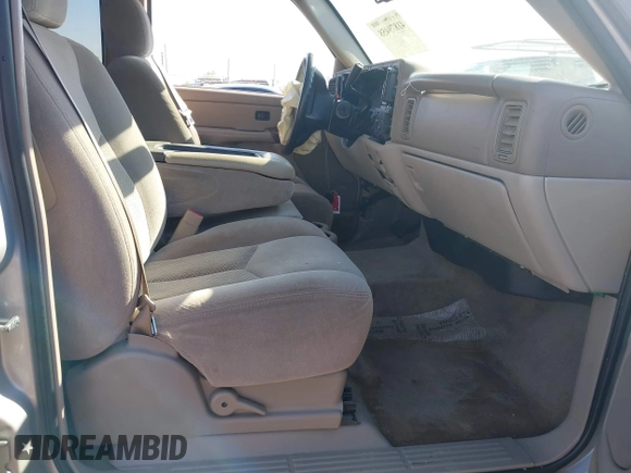 2004 Chevrolet Tahoe LS with VIN 1GNEC13T64J282970, listed as a IAAI auction lot 41879458 with 205,952 mi miles and . Bid and sale history available at DreamBid. Image 5.