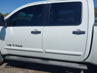 2014 Nissan Titan S with VIN 1N6AA0EC3EN502951, listed as a IAAI auction lot 41956309 with 128,464 mi miles and . Bid and sale history available at DreamBid. Image 14.